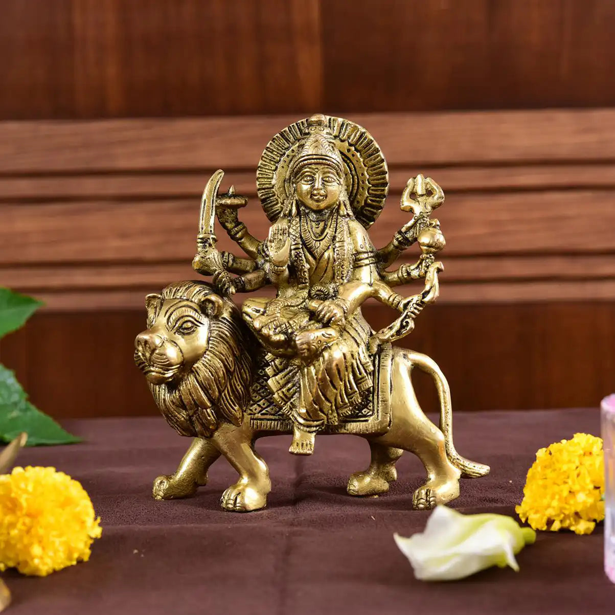 Brass Durga idol sitting on lion for Navratri