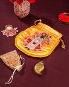 Brass Chopda Shrinathji Festive Potli/Hamper