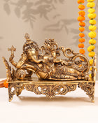 Brass Superfine Ganesha Resting On Couch (9 Inch)