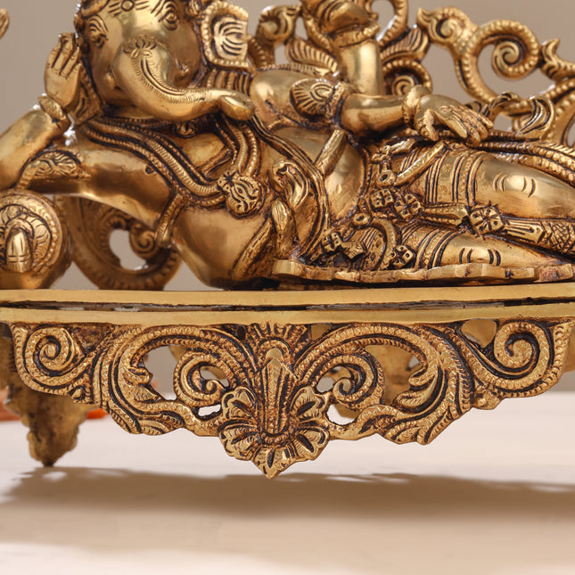 Brass Superfine Ganesha Resting On Couch (9 Inch)