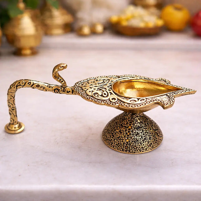 Brass Lightweight Naag Aarti Diya With Handle (5 Inch)