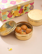 Brass Ladoo Box Gift Hamper – Handcrafted Elegance in Designer Packaging (2 Inch)