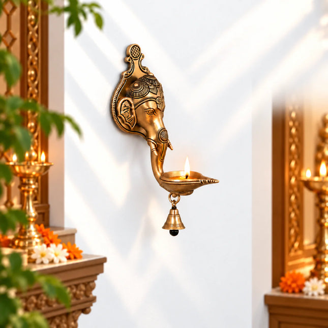 Brass Ganesha Face With Diya & Bell Wall Hanging (10 Inch)