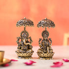 Brass Sitting On Lotus Ganesha And Lakshmi Idols Set With Umbrella (4.5 Inch)