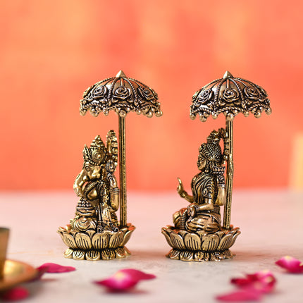 Brass Sitting On Lotus Ganesha And Lakshmi Idols Set With Umbrella (4.5 Inch)