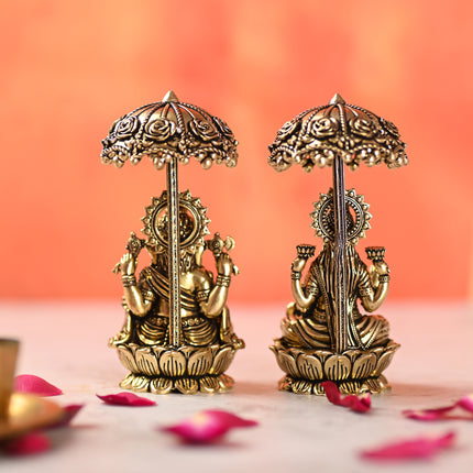 Brass Sitting On Lotus Ganesha And Lakshmi Idols Set With Umbrella (4.5 Inch)