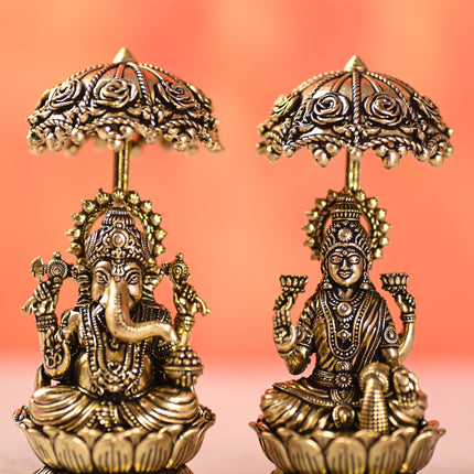 Brass Sitting On Lotus Ganesha And Lakshmi Idols Set With Umbrella (4.5 Inch)