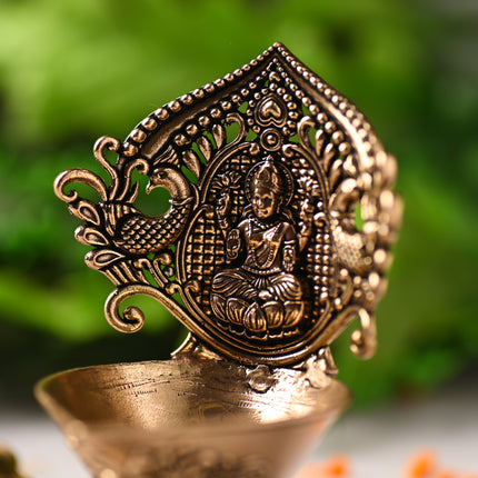 Brass Handcrafted Peacock Lakshmi Diya – Premium Traditional Décor (4.4 Inch)