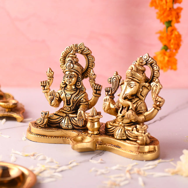 Brass Ganesha and Lakshmi Sitting Idol With Diya (5 Inch)
