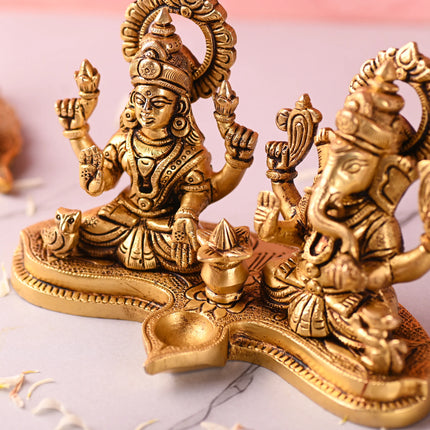 Brass Ganesha and Lakshmi Sitting Idol With Diya (5 Inch)