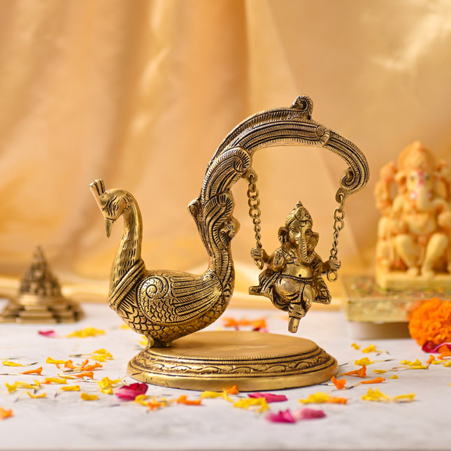 Brass Peacock Jhula with Ganesha Idol – Premium Decor (8 Inch)