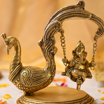 Brass Peacock Jhula with Ganesha Idol – Premium Decor (8 Inch)