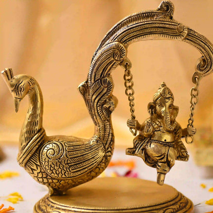 Brass Peacock Jhula with Ganesha Idol – Premium Decor (8 Inch)