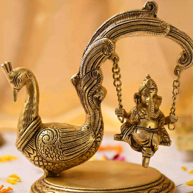Brass Peacock Jhula with Ganesha Idol – Premium Decor (8 Inch)