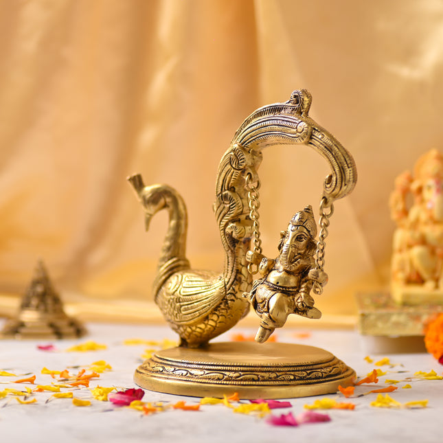 Brass Peacock Jhula with Ganesha Idol – Premium Decor (8 Inch)