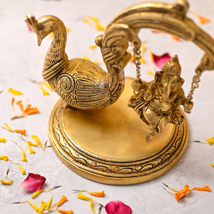 Brass Peacock Jhula with Ganesha Idol – Premium Decor (8 Inch)