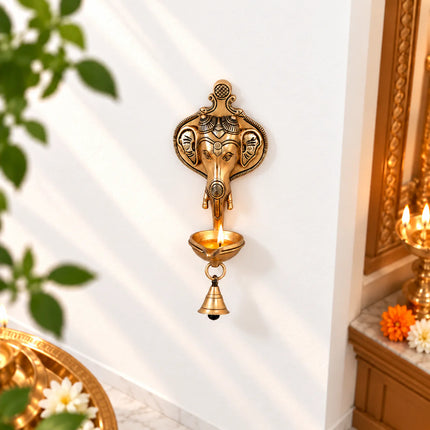 Brass Ganesha Face With Diya & Bell Wall Hanging (10 Inch)