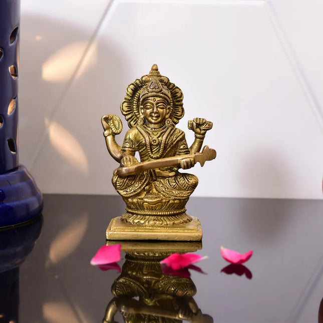 Brass Goddess Sitting Saraswati Idol (4.3 Inch)