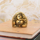 Brass Coconut Shape Sitting Ganesha Idol (2.2 Inch)