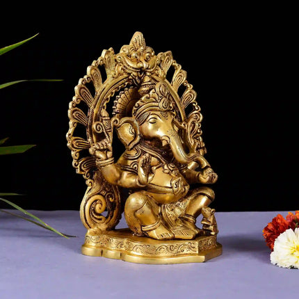 Brass Sitting Ganesha On Prabhavali Singhasan Statue (9 Inch)