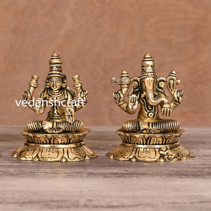 Brass Sitting Ganesha Lakshmi Saraswati On Lotus (3 Inch)