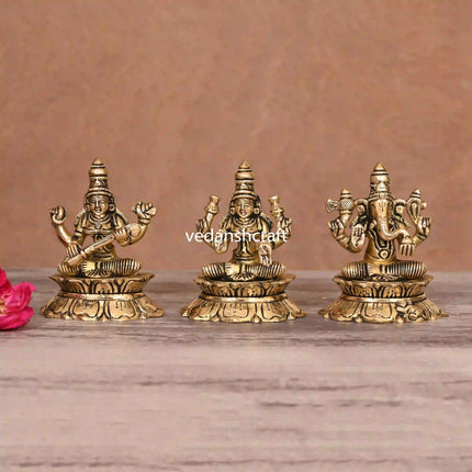 Brass Sitting Ganesha Lakshmi Saraswati On Lotus (3 Inch)
