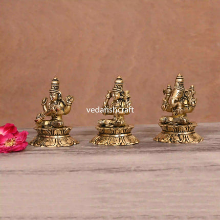 Brass Sitting Ganesha Lakshmi Saraswati On Lotus (3 Inch)