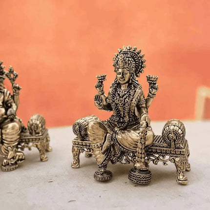 Brass Lightweight Ganesha And Lakshmi Sitting On Throne Idols (4.5 Inch)