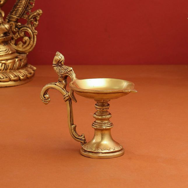 Brass Ethnic Peacock Diya With Handle (5 Inch)