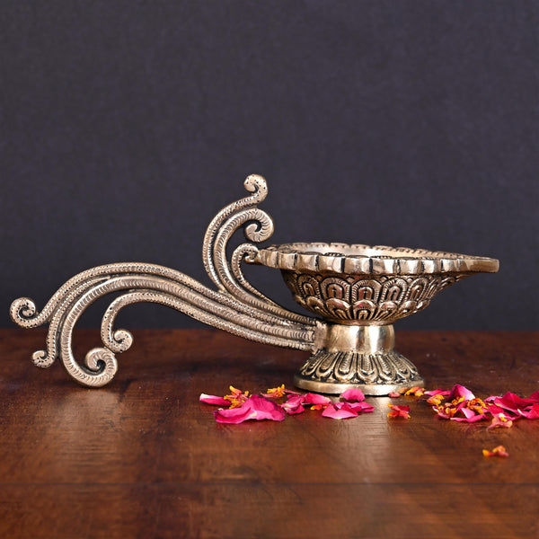 Brass Ethnic Handcarved Diya With Handle (4 Inch)