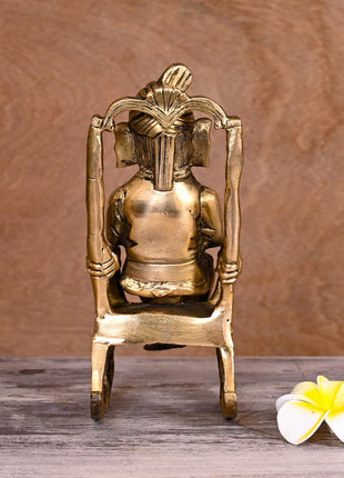 Brass Lord Ganesha Resting On Chair (7.5 Inch)